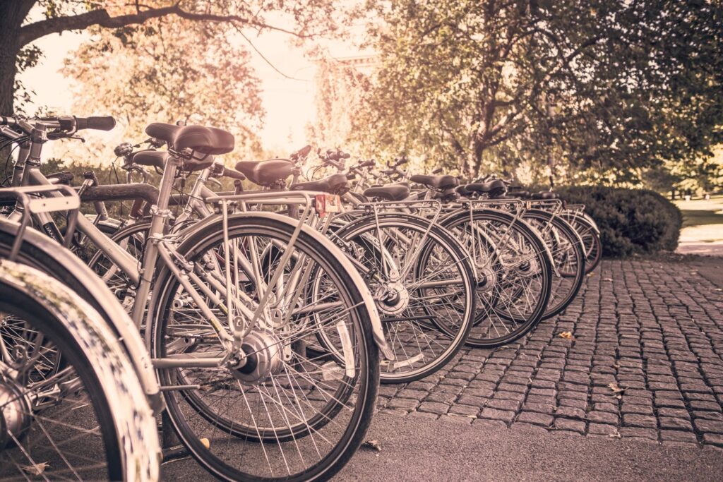 Row of bicycles in a bike rack.
