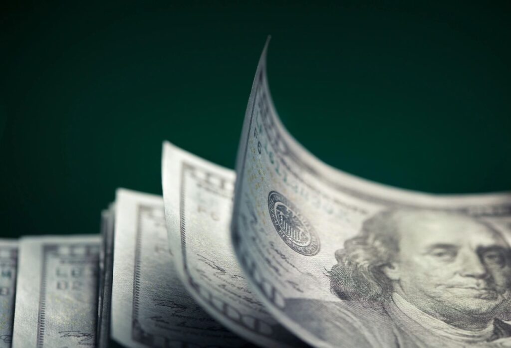 A stack of 100 dollar bills.